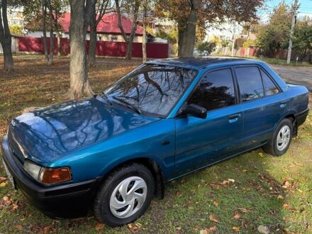 Мазда 323 1994 у Одесі на Automoto.ua Зелений Мазда 323, об'ємом двигуна 1.3 л та пробігом 200 тис. км за 1250 $, фото 1 на Automoto.ua