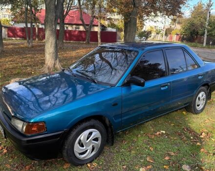 Зеленый Мазда 323, объемом двигателя 1.3 л и пробегом 200 тыс. км за 1250 $, фото 1 на Automoto.ua