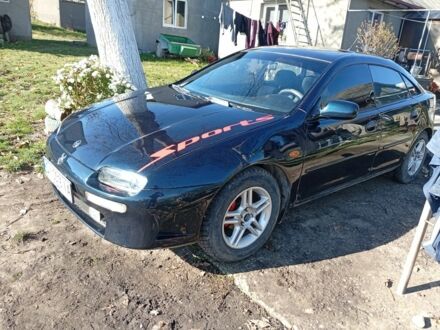 Зелений Мазда 323, об'ємом двигуна 1.5 л та пробігом 227 тис. км за 2500 $, фото 1 на Automoto.ua