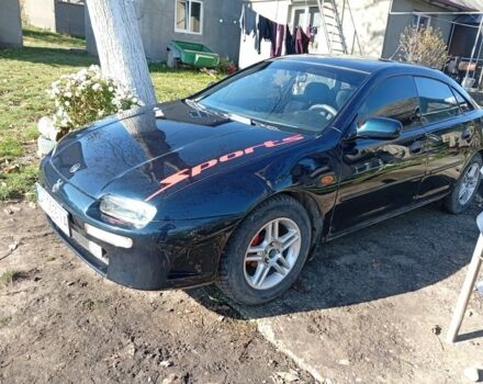 Зеленый Мазда 323, объемом двигателя 1.5 л и пробегом 227 тыс. км за 2500 $, фото 1 на Automoto.ua