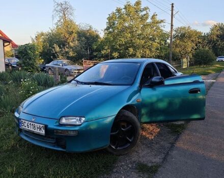 Зелений Мазда 323, об'ємом двигуна 1.49 л та пробігом 250 тис. км за 1400 $, фото 1 на Automoto.ua