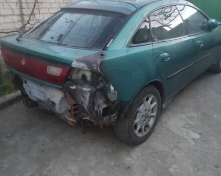 Зеленый Мазда 323, объемом двигателя 2 л и пробегом 1 тыс. км за 1300 $, фото 1 на Automoto.ua