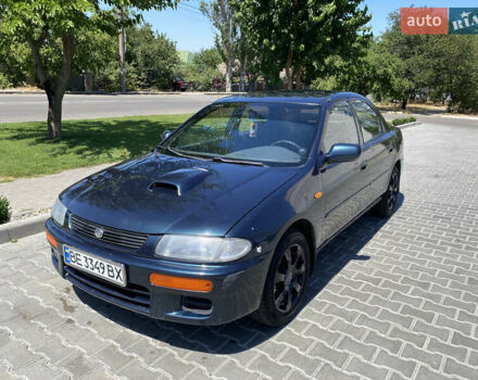 Зеленый Мазда 323, объемом двигателя 1.72 л и пробегом 320 тыс. км за 2300 $, фото 1 на Automoto.ua