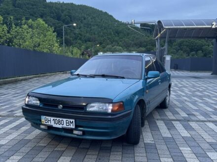 Мазда 323 1995 у Сваляве на Automoto.ua Зелений Мазда 323, об'ємом двигуна 1.6 л та пробігом 224 тис. км за 1450 $, фото 1 на Automoto.ua
