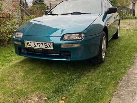 Зелений Мазда 323, об'ємом двигуна 1.49 л та пробігом 322 тис. км за 2600 $, фото 1 на Automoto.ua