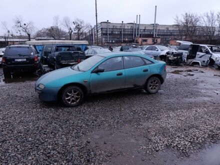 Зеленый Мазда 323, объемом двигателя 1.5 л и пробегом 300 тыс. км за 699 $, фото 1 на Automoto.ua