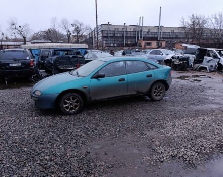 Зеленый Мазда 323, объемом двигателя 1.5 л и пробегом 300 тыс. км за 699 $, фото 1 на Automoto.ua