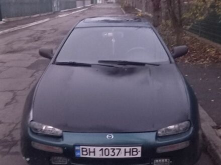 Зеленый Мазда 323, объемом двигателя 1.5 л и пробегом 185 тыс. км за 1700 $, фото 1 на Automoto.ua