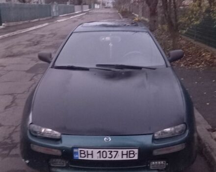 Зеленый Мазда 323, объемом двигателя 1.5 л и пробегом 185 тыс. км за 1700 $, фото 1 на Automoto.ua