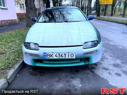 Зеленый Мазда 323, объемом двигателя 1.5 л и пробегом 334 тыс. км за 1800 $, фото 1 на Automoto.ua