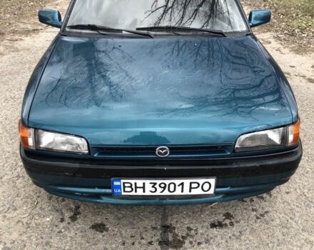 Зеленый Мазда 323, объемом двигателя 1.6 л и пробегом 310 тыс. км за 2200 $, фото 1 на Automoto.ua