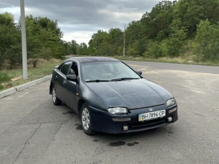 Зеленый Мазда 323, объемом двигателя 0 л и пробегом 465 тыс. км за 1253 $, фото 1 на Automoto.ua