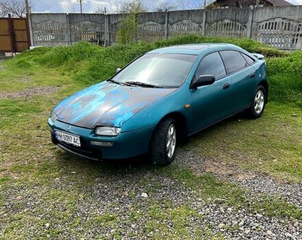 Зеленый Мазда 323, объемом двигателя 1.5 л и пробегом 440 тыс. км за 2100 $, фото 1 на Automoto.ua