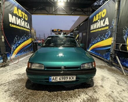 Зелений Мазда 323, об'ємом двигуна 1.6 л та пробігом 3 тис. км за 2300 $, фото 1 на Automoto.ua