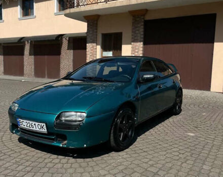 Зеленый Мазда 323, объемом двигателя 1.5 л и пробегом 250 тыс. км за 2000 $, фото 1 на Automoto.ua