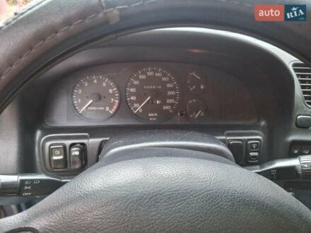 Зеленый Мазда 323, объемом двигателя 1.8 л и пробегом 460 тыс. км за 2900 $, фото 1 на Automoto.ua