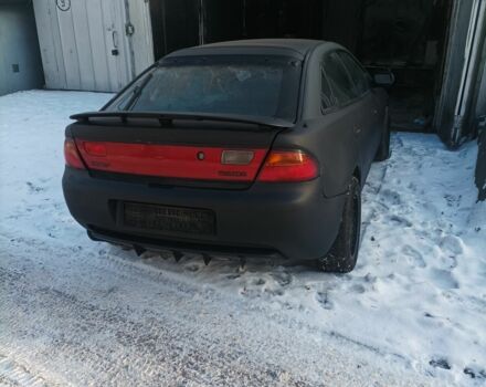 Зеленый Мазда 323, объемом двигателя 1.5 л и пробегом 320 тыс. км за 1500 $, фото 1 на Automoto.ua