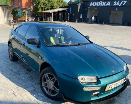Зелений Мазда 323, об'ємом двигуна 1.5 л та пробігом 300 тис. км за 2100 $, фото 1 на Automoto.ua