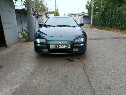 Зелений Мазда 323, об'ємом двигуна 1.5 л та пробігом 210 тис. км за 2500 $, фото 1 на Automoto.ua