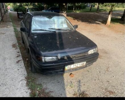 Зелений Мазда 323, об'ємом двигуна 1.6 л та пробігом 2 тис. км за 900 $, фото 1 на Automoto.ua