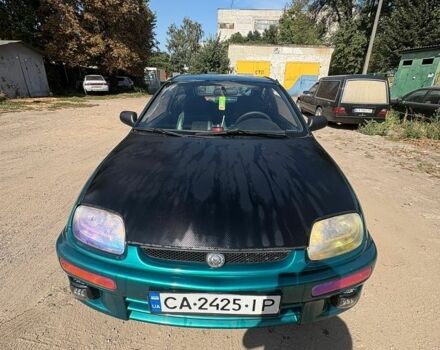 Зелений Мазда 323, об'ємом двигуна 1.49 л та пробігом 336 тис. км за 2600 $, фото 1 на Automoto.ua