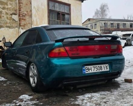 Зелений Мазда 323, об'ємом двигуна 1.8 л та пробігом 250 тис. км за 789 $, фото 1 на Automoto.ua