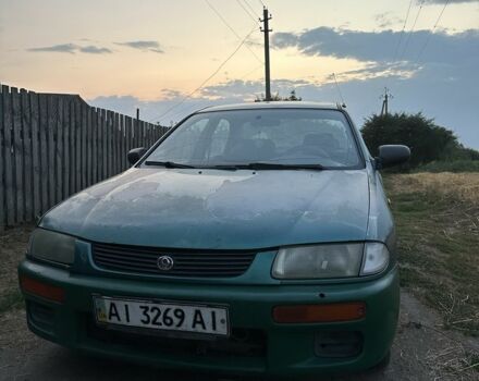 Зелений Мазда 323, об'ємом двигуна 1.8 л та пробігом 320 тис. км за 402 $, фото 1 на Automoto.ua