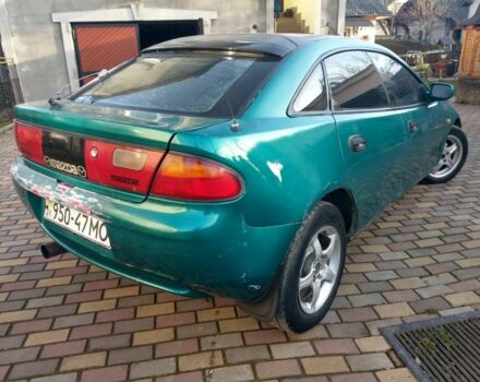 Зеленый Мазда 323, объемом двигателя 1.5 л и пробегом 100 тыс. км за 1350 $, фото 1 на Automoto.ua