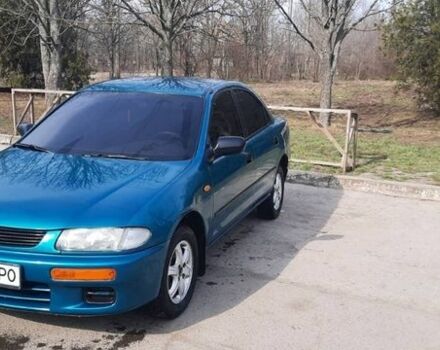 Зелений Мазда 323, об'ємом двигуна 1.5 л та пробігом 350 тис. км за 2200 $, фото 1 на Automoto.ua