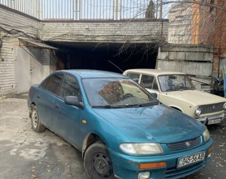 Зеленый Мазда 323, объемом двигателя 1.5 л и пробегом 424 тыс. км за 1500 $, фото 1 на Automoto.ua