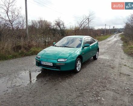 Зелений Мазда 323, об'ємом двигуна 1.49 л та пробігом 350 тис. км за 2100 $, фото 1 на Automoto.ua