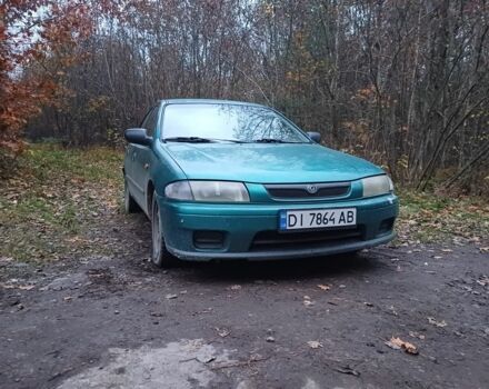 Зелений Мазда 323, об'ємом двигуна 1.5 л та пробігом 308 тис. км за 1548 $, фото 1 на Automoto.ua