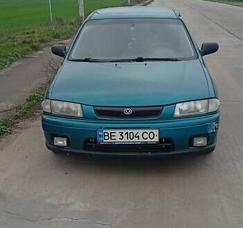 Зелений Мазда 323, об'ємом двигуна 1.49 л та пробігом 150 тис. км за 1800 $, фото 1 на Automoto.ua