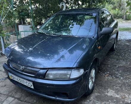 Зелений Мазда 323, об'ємом двигуна 1.5 л та пробігом 500 тис. км за 1100 $, фото 1 на Automoto.ua