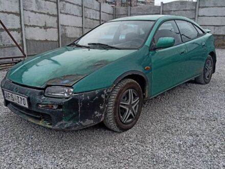 Зеленый Мазда 323, объемом двигателя 1.5 л и пробегом 100 тыс. км за 474 $, фото 1 на Automoto.ua