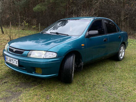 Зелений Мазда 323, об'ємом двигуна 1.5 л та пробігом 340 тис. км за 2400 $, фото 1 на Automoto.ua