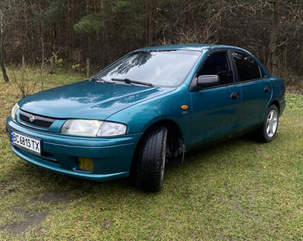 Зелений Мазда 323, об'ємом двигуна 1.5 л та пробігом 340 тис. км за 2400 $, фото 1 на Automoto.ua