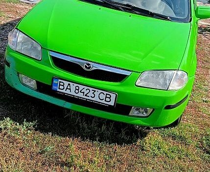 Зеленый Мазда 323, объемом двигателя 1.3 л и пробегом 254 тыс. км за 1900 $, фото 1 на Automoto.ua