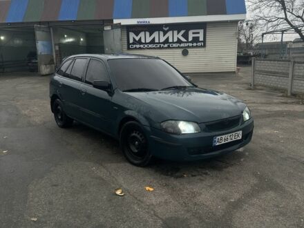 Зеленый Мазда 323, объемом двигателя 1.5 л и пробегом 400 тыс. км за 1500 $, фото 1 на Automoto.ua