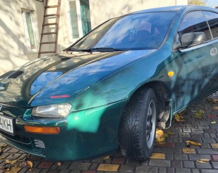 Зеленый Мазда 323, объемом двигателя 1.5 л и пробегом 270 тыс. км за 2199 $, фото 1 на Automoto.ua