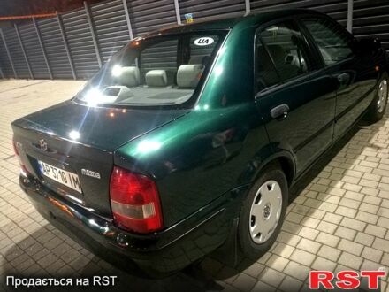 Зелений Мазда 323, об'ємом двигуна 1.5 л та пробігом 320 тис. км за 2800 $, фото 1 на Automoto.ua