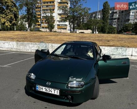 Зеленый Мазда 323, объемом двигателя 1.5 л и пробегом 363 тыс. км за 3500 $, фото 1 на Automoto.ua