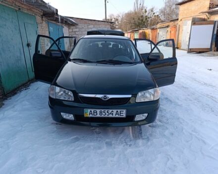 Зелений Мазда 323, об'ємом двигуна 1.5 л та пробігом 143 тис. км за 3800 $, фото 1 на Automoto.ua