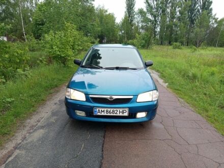 Зелений Мазда 323, об'ємом двигуна 1.5 л та пробігом 100 тис. км за 2300 $, фото 1 на Automoto.ua