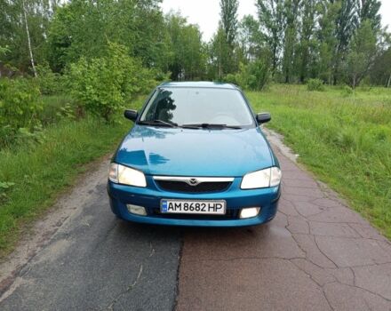 Зелений Мазда 323, об'ємом двигуна 1.5 л та пробігом 100 тис. км за 2300 $, фото 1 на Automoto.ua