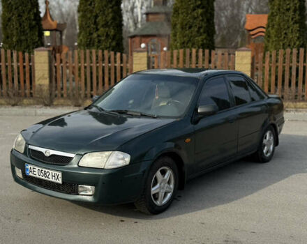 Зеленый Мазда 323, объемом двигателя 1.84 л и пробегом 254 тыс. км за 1850 $, фото 1 на Automoto.ua