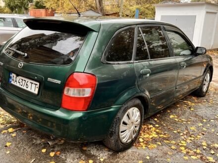 Зеленый Мазда 323, объемом двигателя 1.5 л и пробегом 350 тыс. км за 2400 $, фото 1 на Automoto.ua