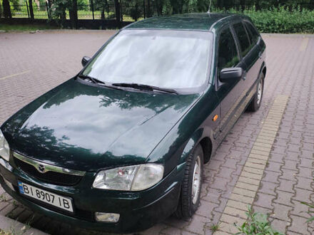 Зелений Мазда 323, об'ємом двигуна 1.3 л та пробігом 174 тис. км за 3000 $, фото 1 на Automoto.ua