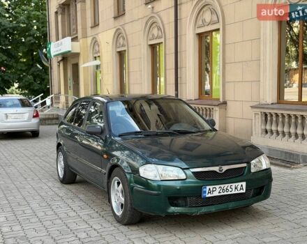 Зеленый Мазда 323, объемом двигателя 1.5 л и пробегом 250 тыс. км за 1750 $, фото 1 на Automoto.ua