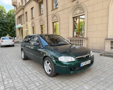 Зеленый Мазда 323, объемом двигателя 1.5 л и пробегом 250 тыс. км за 1850 $, фото 1 на Automoto.ua